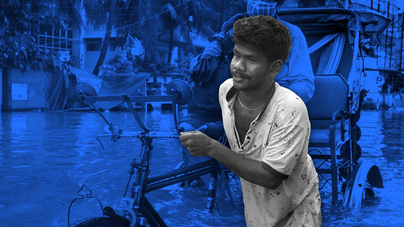 blog life man pushing rickshaw